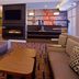 Courtyard by Marriott Aberdeen at Ripken Stadium lobby with fireplace, seating area and TV