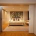 Montebelo Viseu Congress Hotel, Viseu: bedroom with king bed, sliding doors and lounge chair