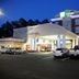 Holiday Inn Express & Suites Bainbridge By IHG exterior at dusk with covered entrance and parked cars