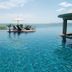 Samui Buri Beach Resort in Ko Samui with infinity pool overlooking the sea and lounge chairs