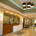 Hampton Inn & Suites by Hilton Cathedral City Palm Springs lobby with front desk and modern lighting
