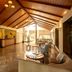 Gateway Chikmagalur lobby with vaulted wooden ceiling, reception desk and lounge seating in Chikamagalur