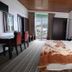 Ashley Resort, Nuwara Eliya guest room with twin beds, desk, wardrobe and balcony view