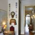 Alvares Cabral Guest House in Porto interior hallway with wooden floors and seating area