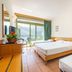 Park Hotel Abbadia in Abbadia Lariana, bright room with two beds and balcony mountain view