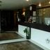 Maratea Mare in Florianopolis lobby with reception desk, potted plants and seating area