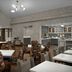 Homewood Suites by Hilton Birmingham-SW-Riverchase-Galleria in Hoover breakfast area with stone fireplace and dining tables