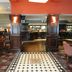Premier Inn Leicester North West bar and lounge area in Leicester with wood paneling and patterned carpet