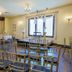 Swantown Inn & Spa in Olympia ballroom with rows of chairs and a window nook