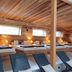 Berg & Spa Hotel Gabelbach in Ilmenau: rustic sauna lounge with wooden walls and reclining chairs