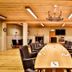 Järvsöbaden in Järvsö meeting room with long conference table, leather chairs and wood-paneled ceiling