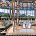 Calista Luxury Resort in Belek lobby with grand staircase, floor-to-ceiling windows and pool view