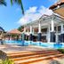 Sari Pacifica Resort & Spa, Redang Island: poolside resort terrace with blue swimming pool and covered pavilion