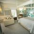 Hardwicke Hall Manor Hotel in Hartlepool bedroom with four-poster bed, sofa and armchairs