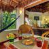 Riviera Maya Suites, Playa del Carmen: hammock and breakfast table on a tropical balcony