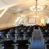 Fletcher Hotel Landgoed Huis te Eerbeek in Eerbeek conference room with rows of chairs and chandelier