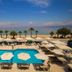Santa Beach Hotel in Agía Triáda with pool, sun loungers and beachfront sea view