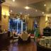 Sammy Dalat Hotel in Dalat dining room with buffet tables, chandeliers and garden-view windows
