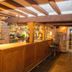 The Manor House Hotel, Dronfield: rustic hotel bar with wooden counter and stone walls
