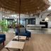 Baselite-Westbund Serviced Apartment Shanghai lounge with blue chairs, umbrella table and pool table