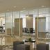 H+ Hotel Wiesbaden Niedernhausen lobby with glass meeting rooms and seating in Niedernhausen