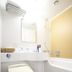 Karasuma Kyoto Hotel bathroom with toilet, sink, mirror and shower tub in Kyoto
