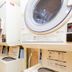 Laundry room at Toyoko Inn Takamatsu Hyogomachi in Takamatsu with stacked washers and dryers