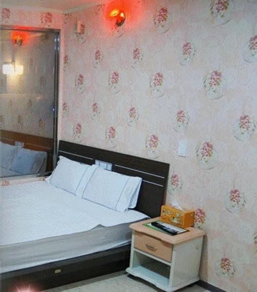 Sun City Motel - Busan - Bedroom