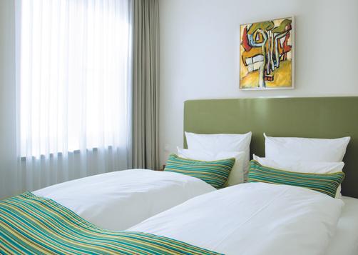 Rostock Apartment Living Hotel - Rostock - King bedroom