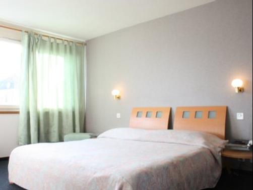 Hotel City - Delemont - Bedroom