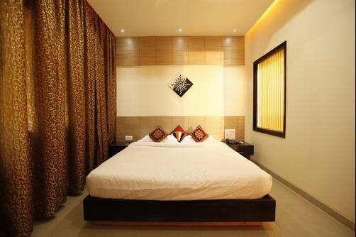 Arafa Inn - Bengaluru - Bedroom