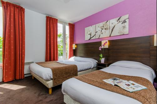 Hôtel Kyriad Paris Porte d'Orléans - Montrouge - Bedroom