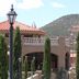 Cedars Resort in Sedona with terracotta roof, courtyard lampposts, and mountain backdrop