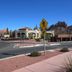 Cedars Resort in Sedona with a courtyard-style building and red rock backdrop beside a road