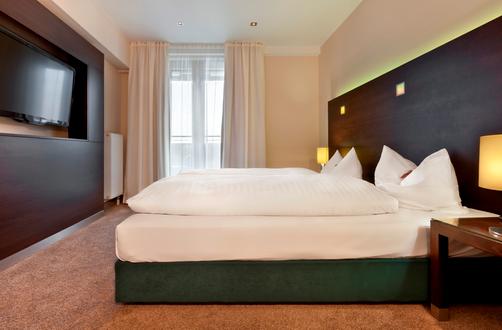 Fleming's Hotel München Schwabing - Munich - Bedroom