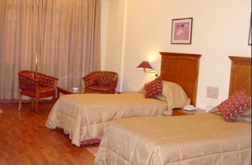 Nirula's Hotel - Noida - Bedroom