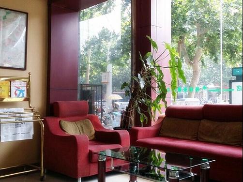 Green Tree Inn Jining Jianshe Road Hotel - Jining - Living room