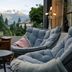 Sendlhofer's in Bad Hofgastein terrace seating with mountain views and cozy cushioned chairs