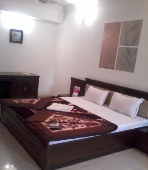 Hotel Orchid 24x7 - Ahmedabad - Bed