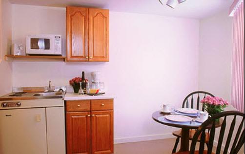 Garrison Suites, Motel and Cottages - Wells - Kitchen
