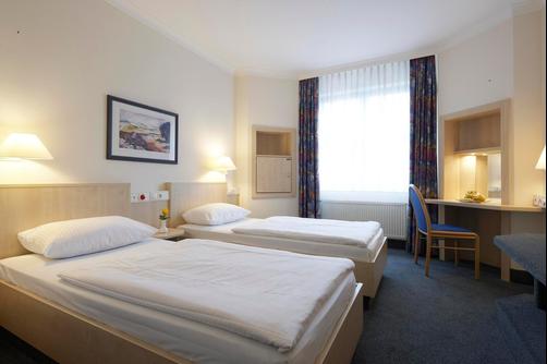 InterCityHotel Magdeburg - Magdeburg - Bedroom