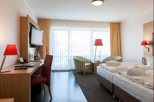 Upstalsboom Hotel am Strand - Nordseeheilbad Horumersiel-Schillig - Bedroom