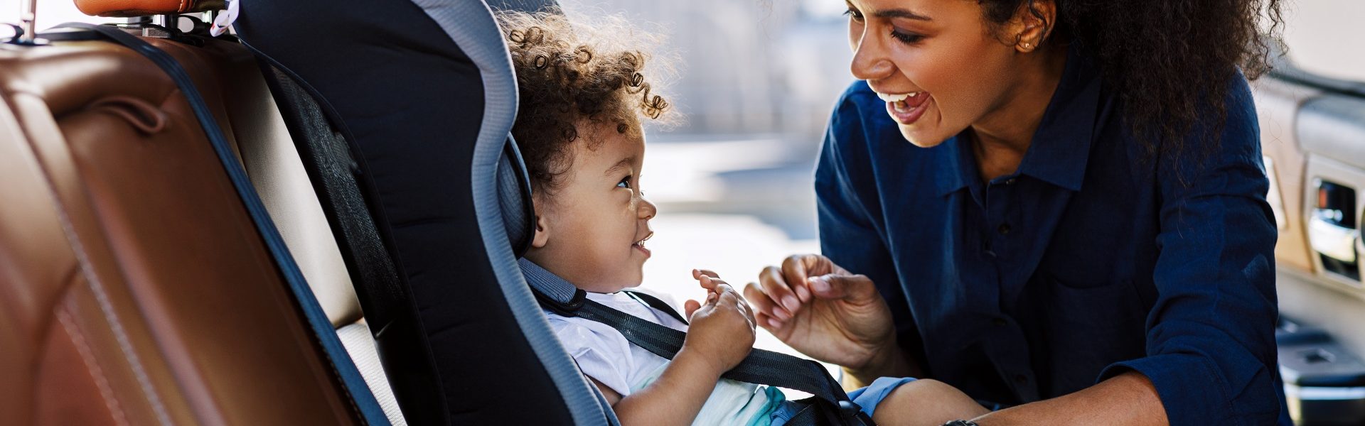 What are the rules for child seats in rental cars?