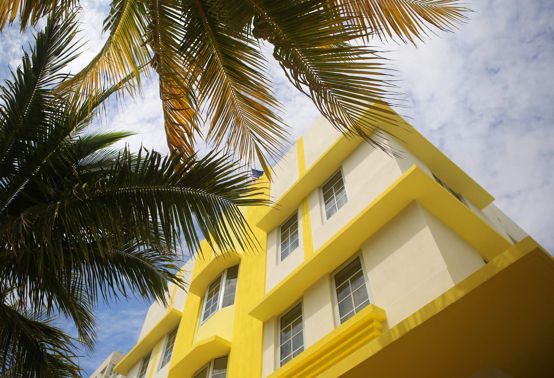 Bright yellow and white facade of residential building in Miami Beach, Miami, Florida, USA