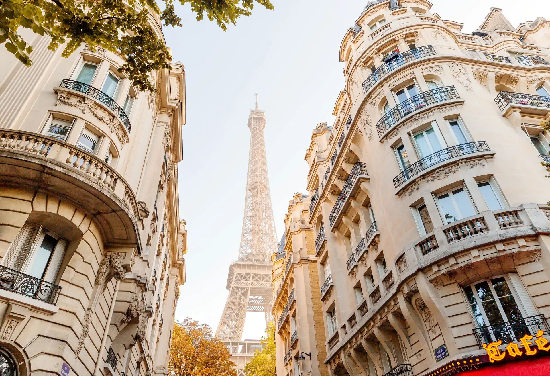 View of the Eiffel Tower in between two buildings