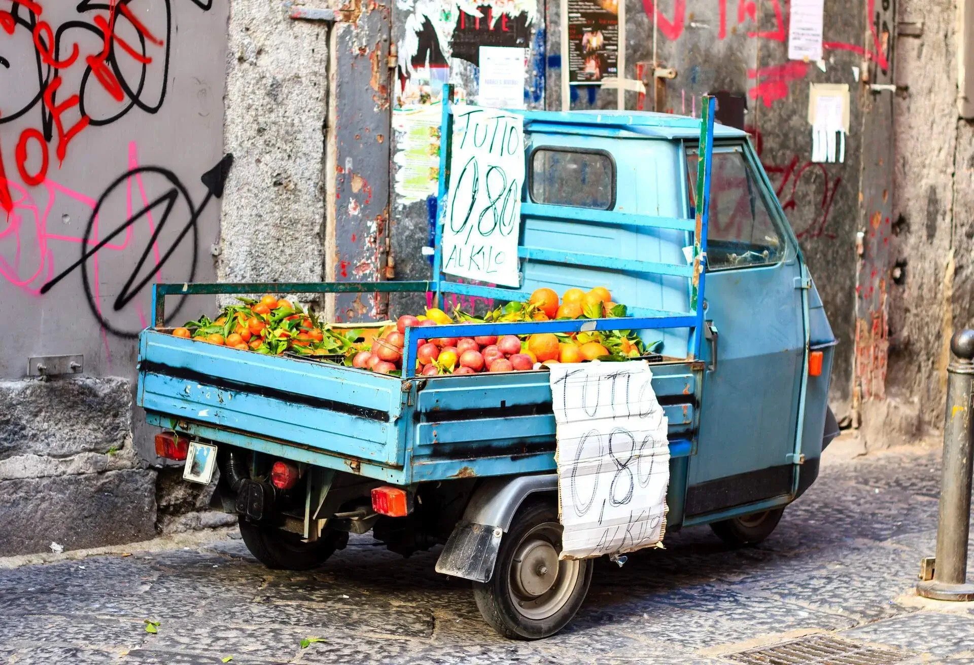 A small truck carrying fruits in Naples