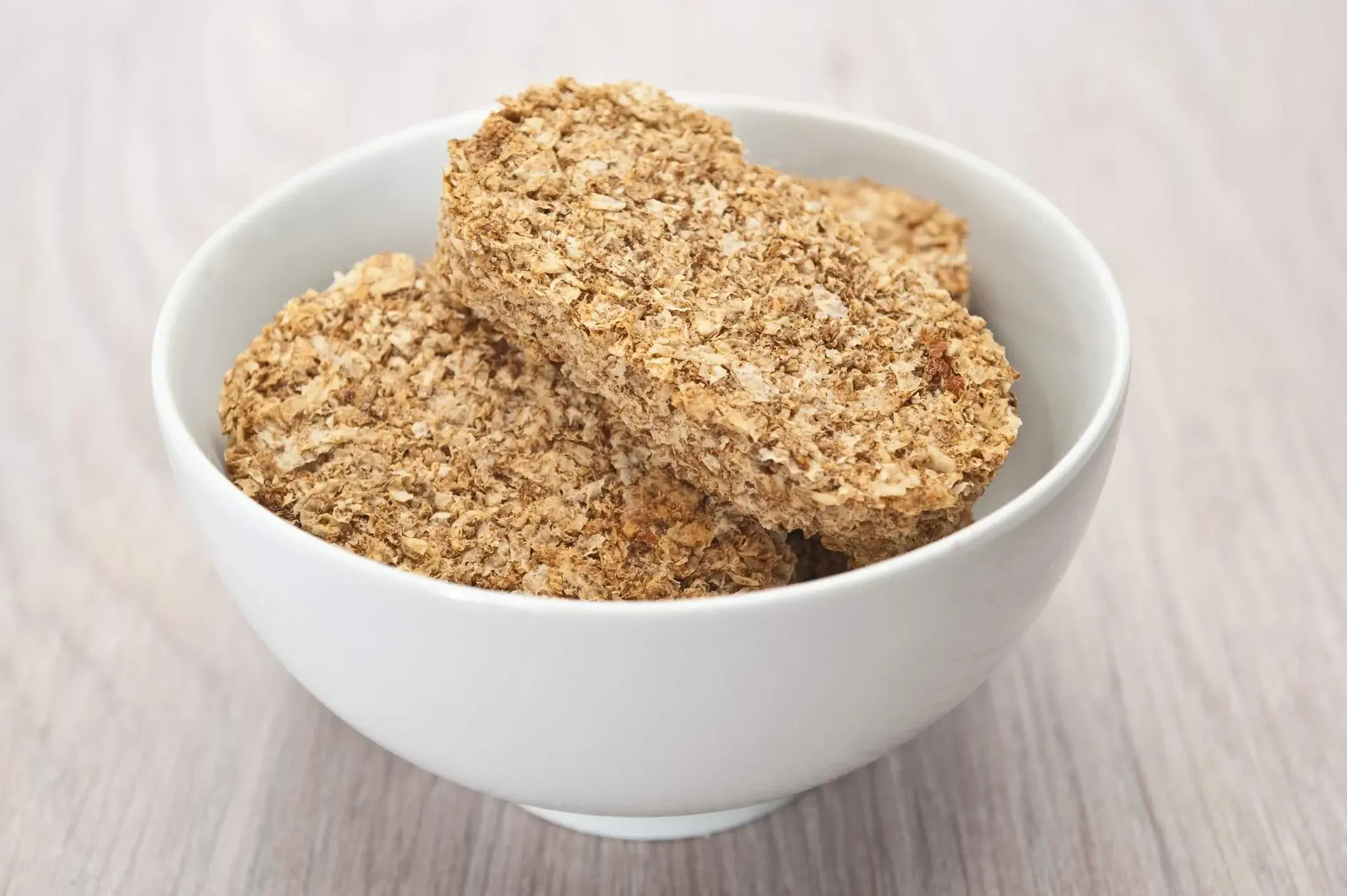 white bowl with pieces of weet-bix