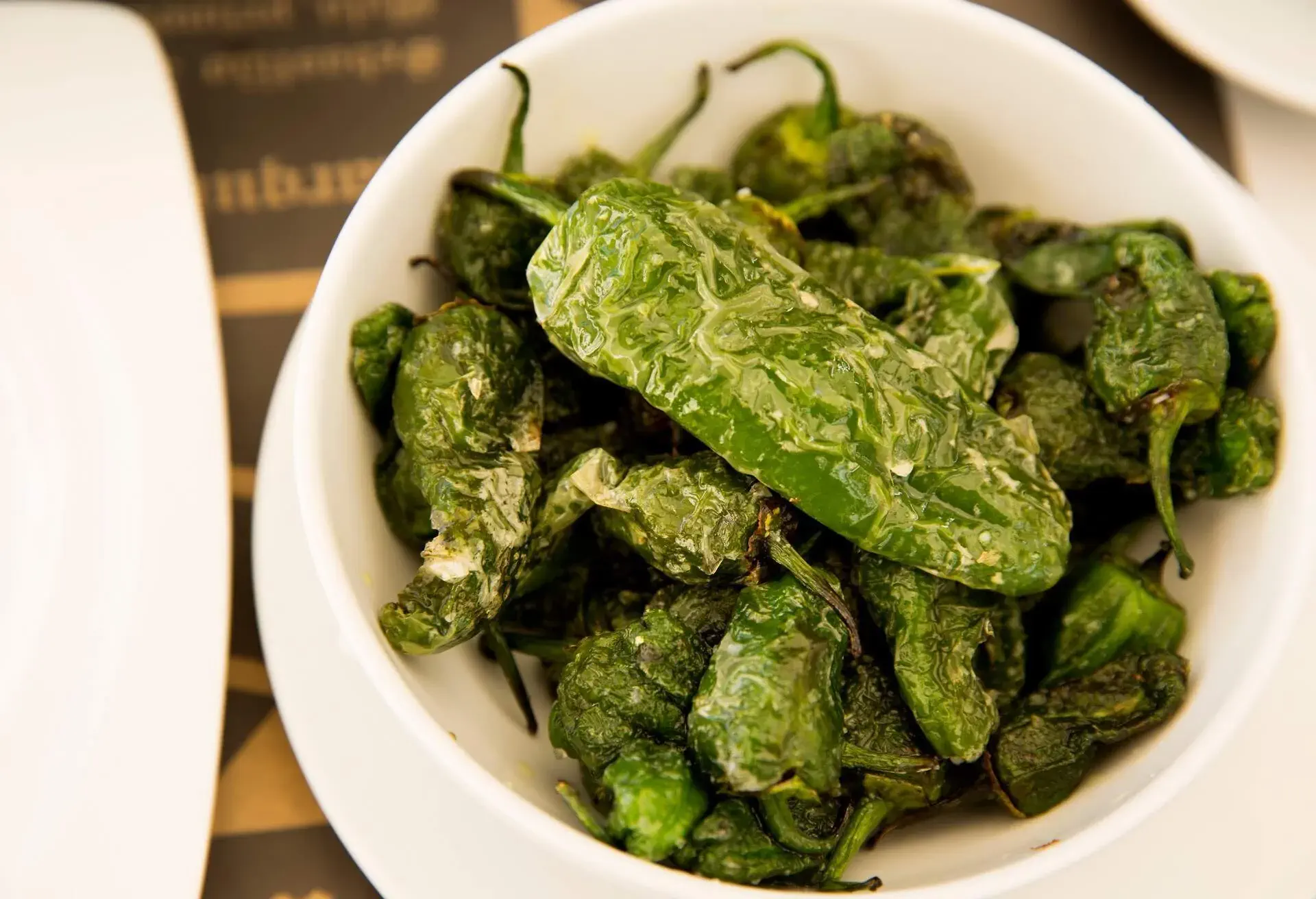 Pimiento de Padron in a white bowl
