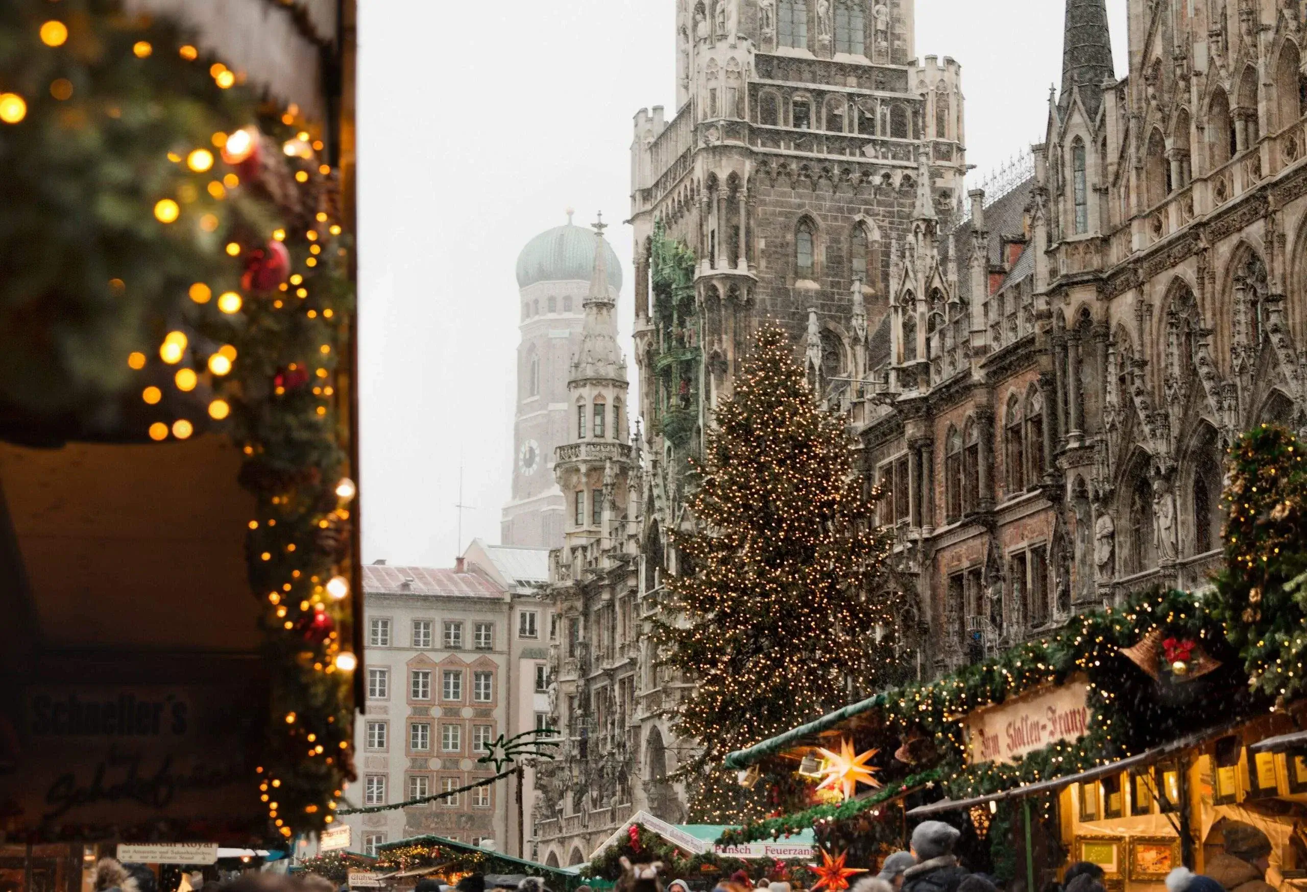 Facade of Munich's New Town Hall with neo-gothic architecture in front of the Christmas Market.