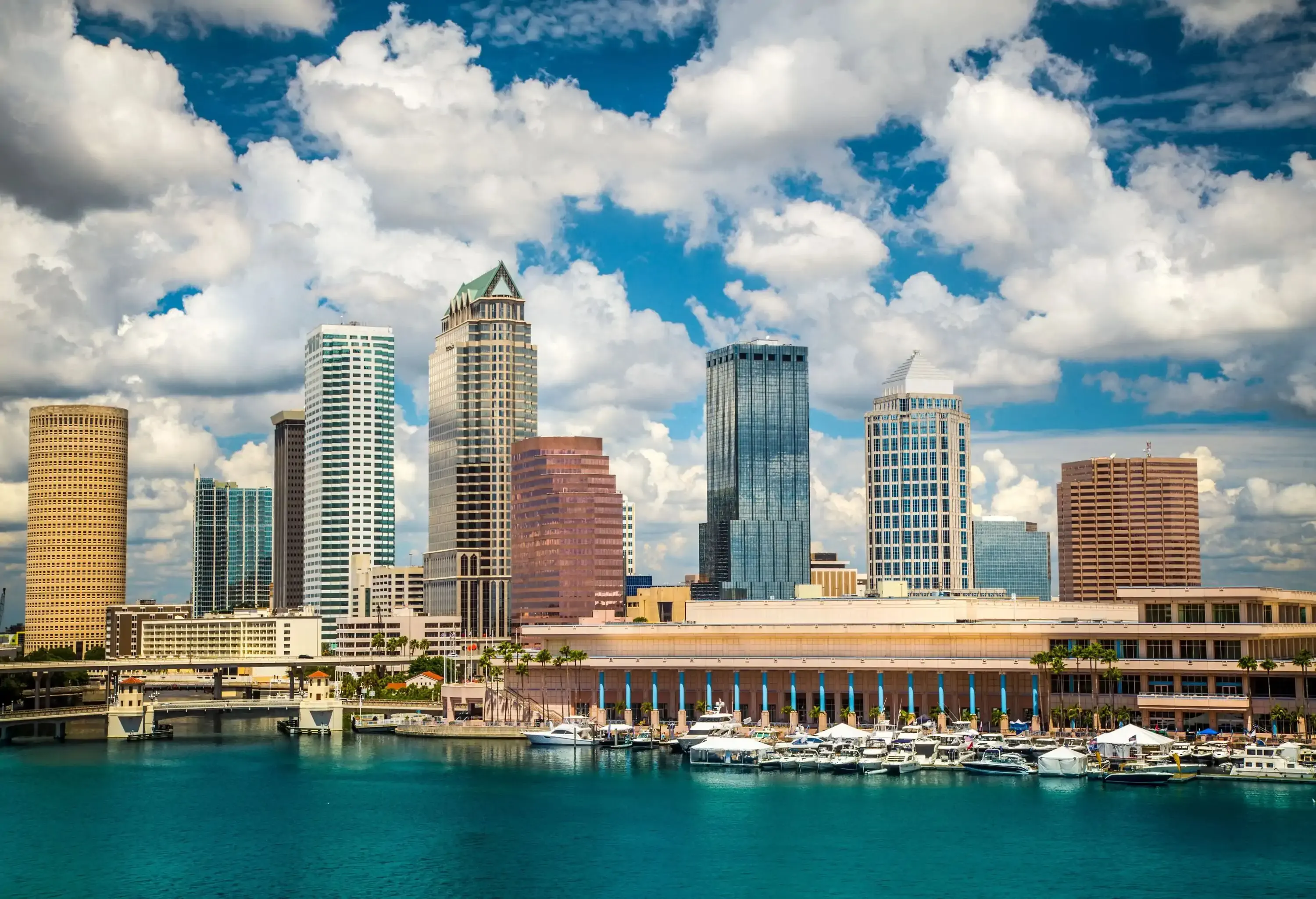 Tampa Florida skyline with sun and clouds